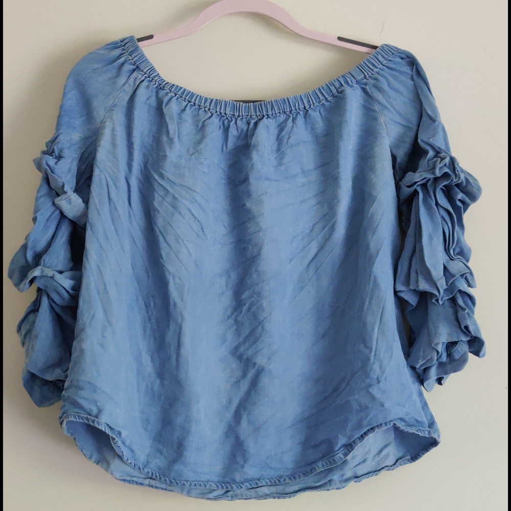 Off the shoulder, ruffle sleeve blouse.